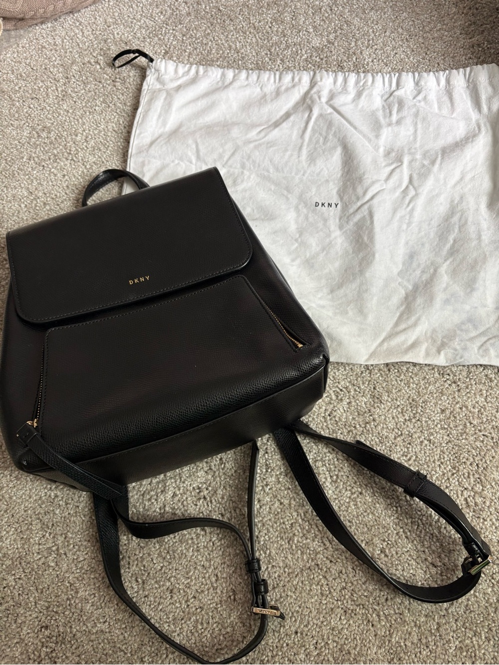 DKNY Black Leather Backpack with Gold Accents